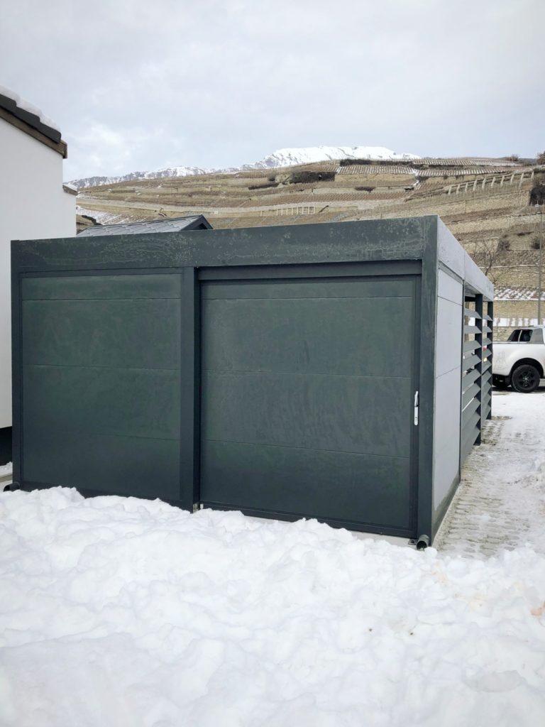 abri voiture avec local ferme integre a sion valais suisse