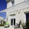 Marquise cintrée alu et polycarbonate - Arbois (39) auvent sur mesure arbois scaled 1